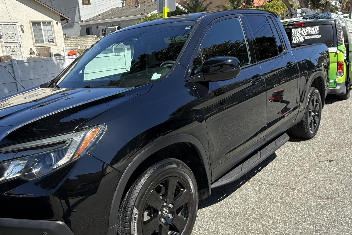 detailed Honda Ridgeline next to the mobile detailing van - Auto Detail Nation