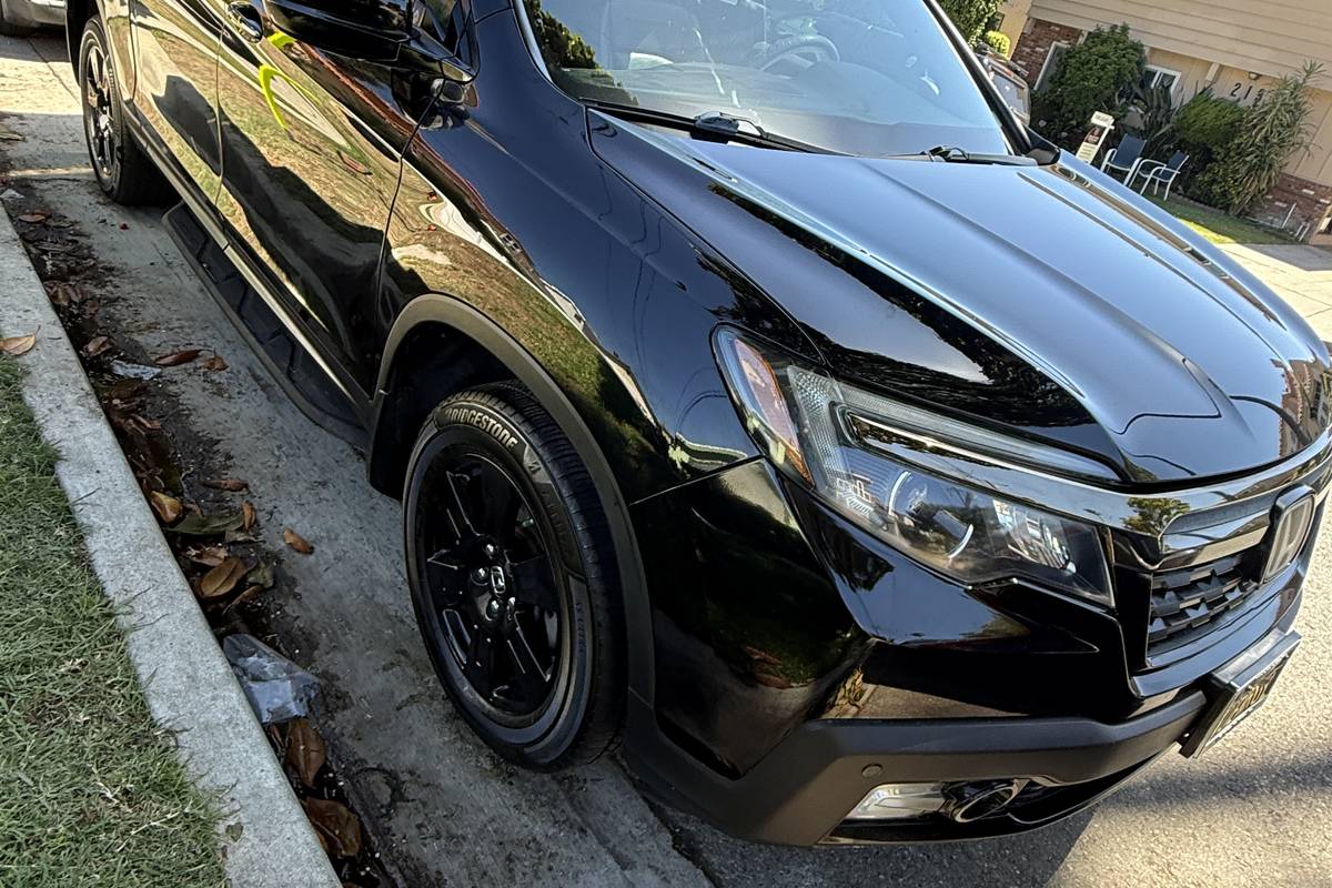 machine polished black paint on a Honda Ridgeline - Auto Detail Nation